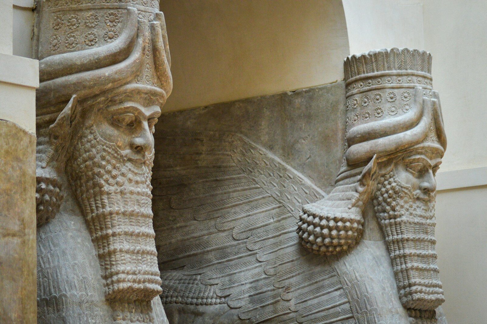 A close up of two statues of elephants